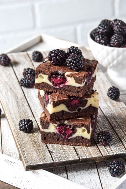 Cheesecake brownies with blackberries